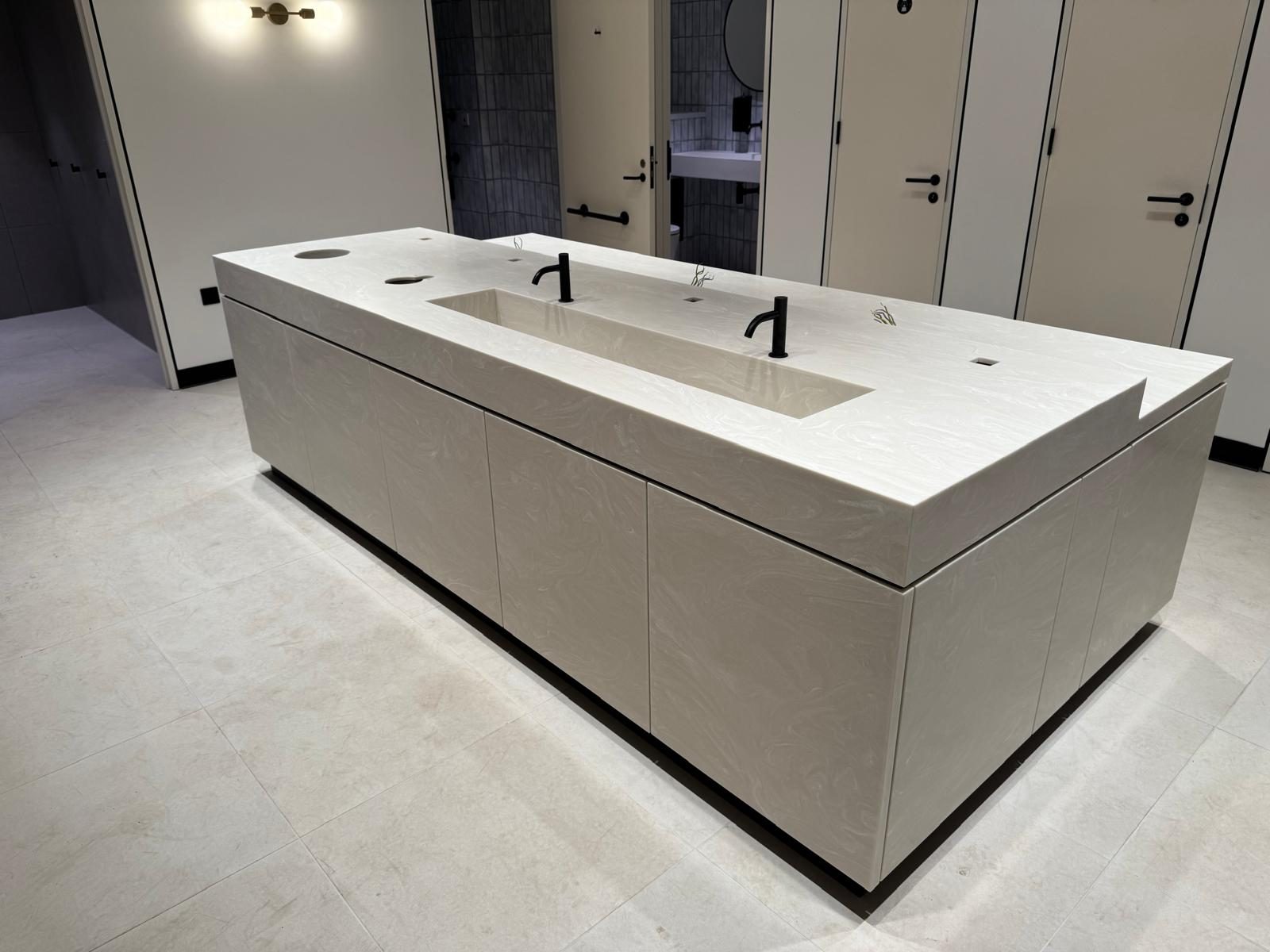 Seamless solid surface washtrough