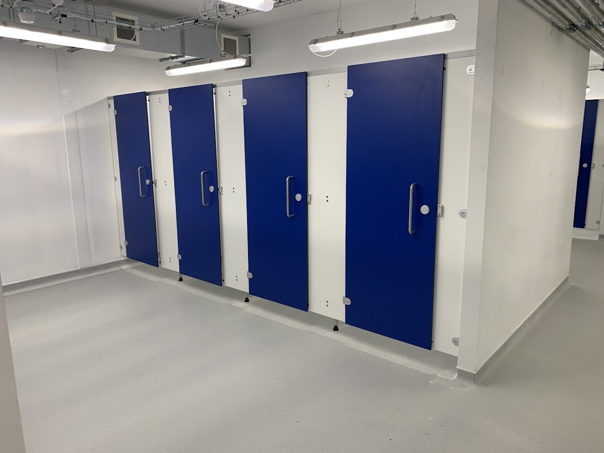 Idealpod toilet cubicles in blue and white